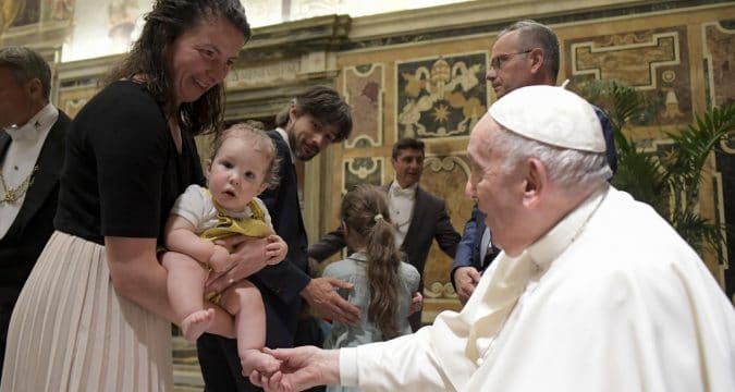 Surrogacy and pornography threaten human dignity, pope says Surrogacy and pornography threaten human dignity, pope says