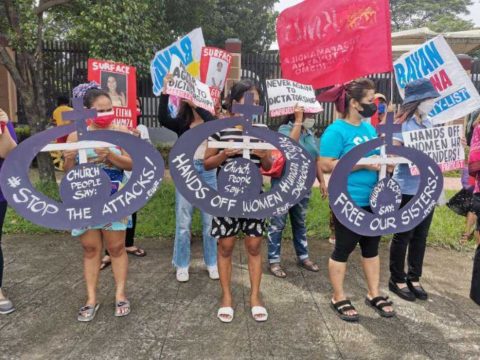 Filipino women march to end domestic violence Filipino women march to end domestic violence