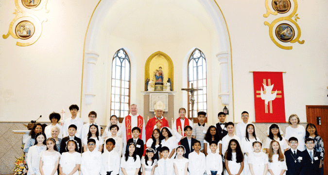 First communion and confirmation at Rosary Church
