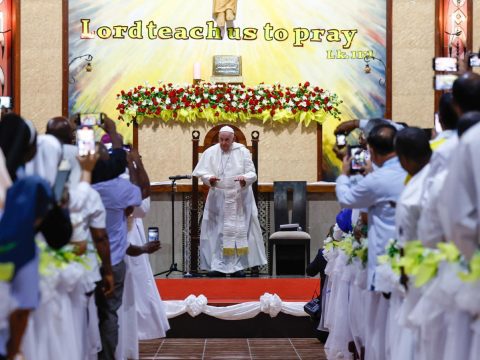 Pope speaks of refuge for Aung San Suu Kyi, and warns against clericalism