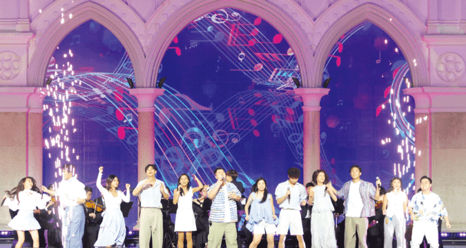 Young people shine in front of the cathedral Young people shine in front of the cathedral